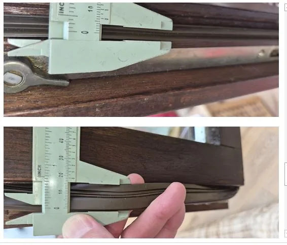 Détail de quincaillerie, poignée ou fermeture de menuiserie